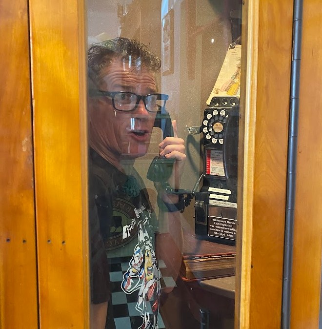 Bryan Jackson in phone booth